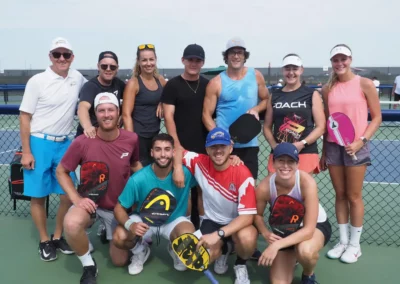 outdoor pickleball courts - group of happy players