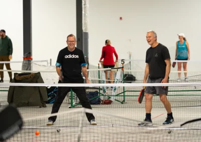 bower place indoor pickleball courts - 2 men laughing